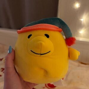 Yellow Plush Toy with Green and Red Hat